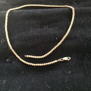 Child’s silver bead necklace